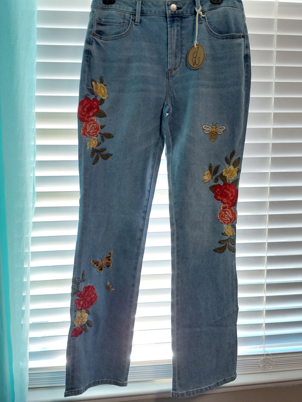 Driftwood Embroidered Light Wash Women's Jeans with Floral & Butterfly Motifs. 8